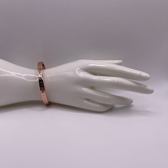 COACH Women's Rose Gold Kissing C Logo Signature Hinged Crystal Bangle Bracelet - Picture 11 of 12